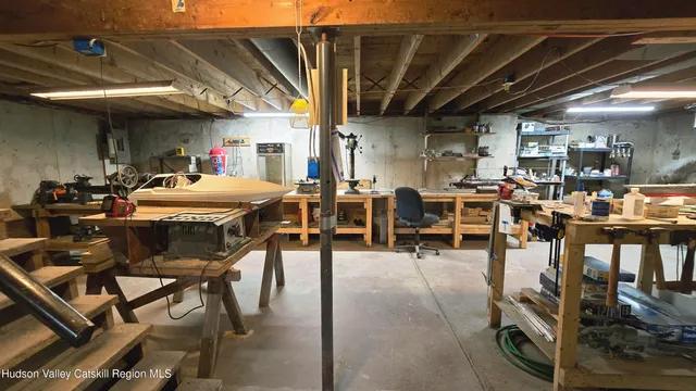 a view of a patio with table and chairs