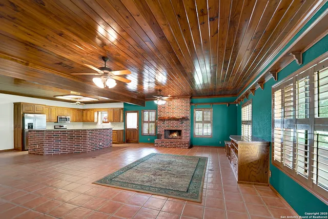 a outdoor space with lots of furniture and windows