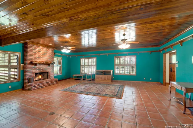 a view of a porch with a fireplace