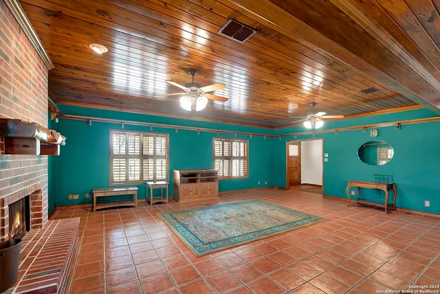 a outdoor space with lots of furniture and windows