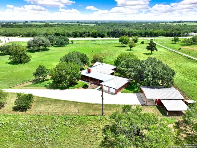 a view of a garden with an outdoor space