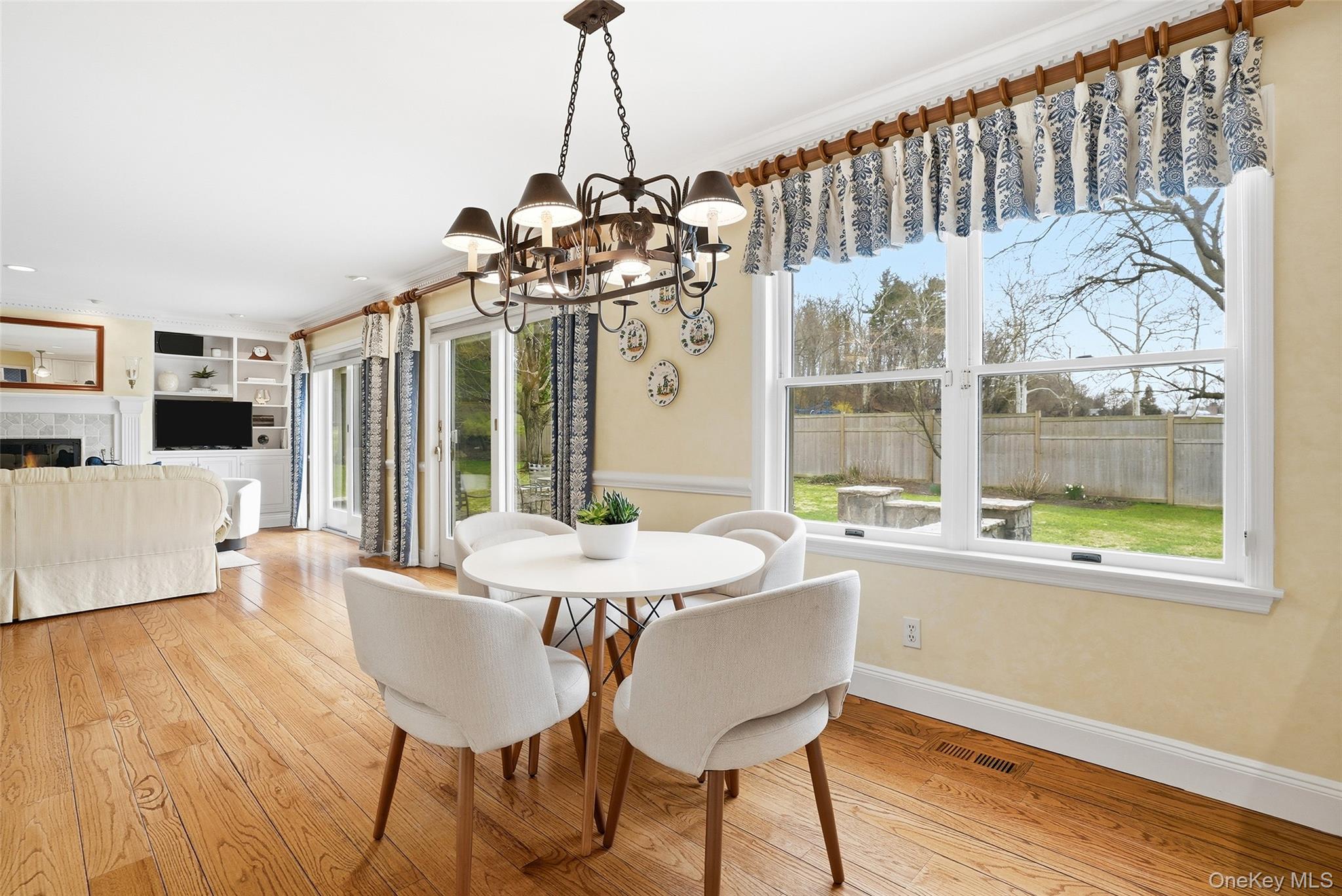 4 Ellis Court Rye, NY 10580 - Photo 13 of 34 With floor to ceiling glass doors and walls of windows, the heart of the house --kitchen, breakfast area and family room--remain light and bright most of the day