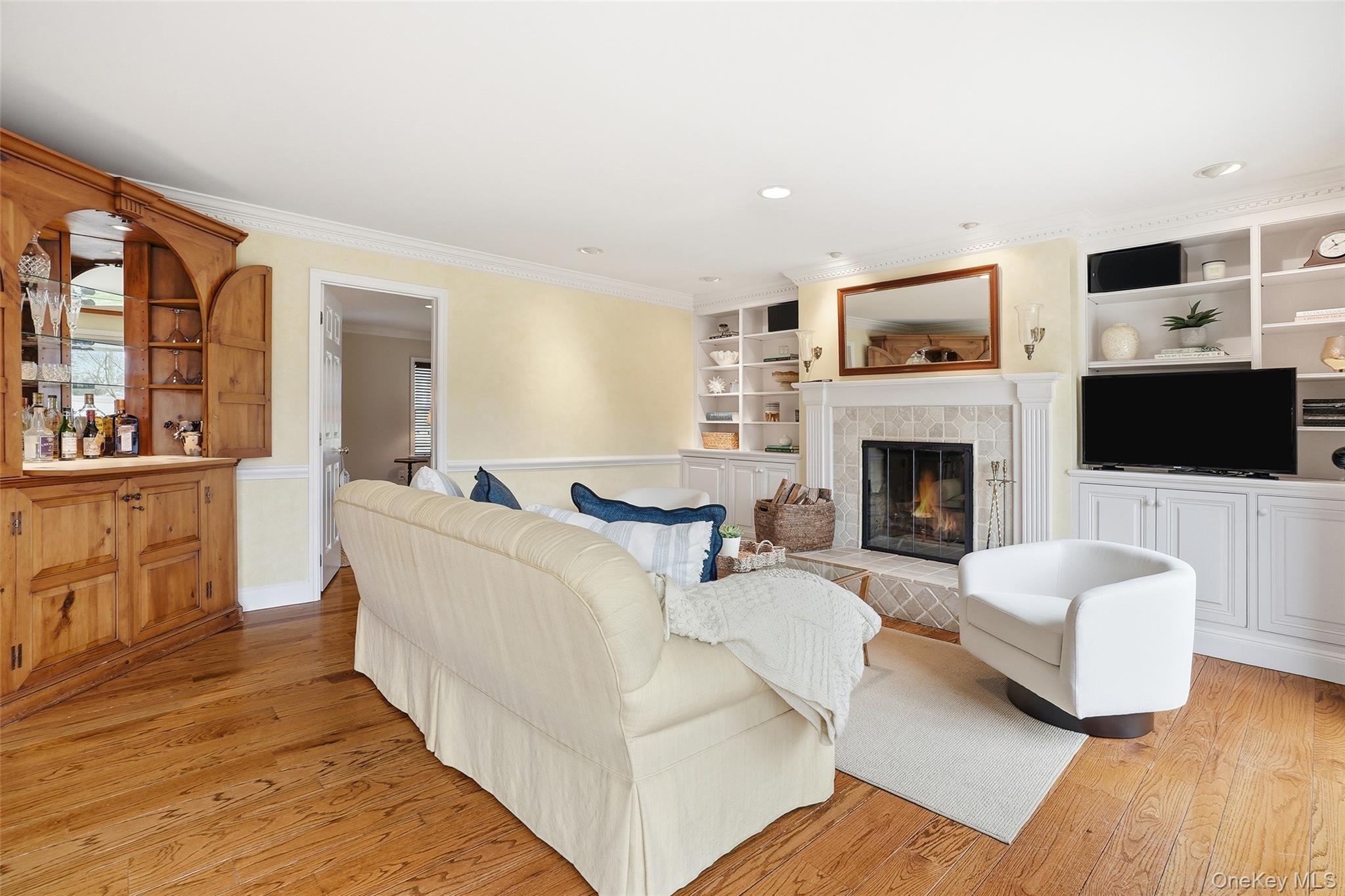 4 Ellis Court Rye, NY 10580 - Photo 10 of 34 Family Room features a wood burning fireplace
