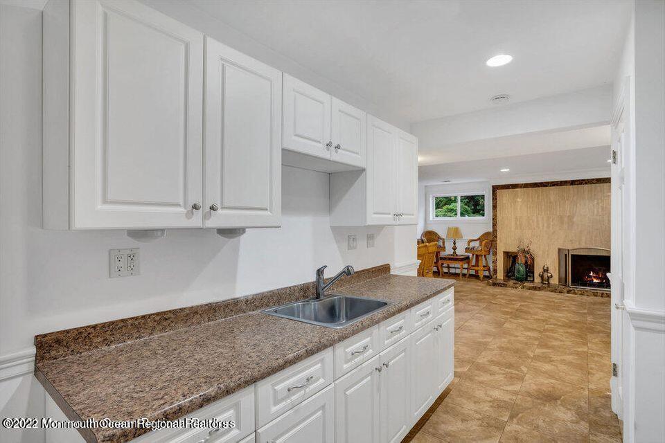 48 Mine Brook Road Colts Neck, NJ 07722 - Photo 33 of 51 Summer Kitchen lower level