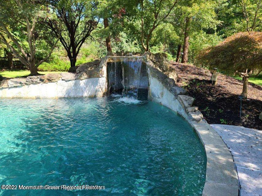 48 Mine Brook Road Colts Neck, NJ 07722 - Photo 38 of 51 Pool w/Grotto and Water Fall
