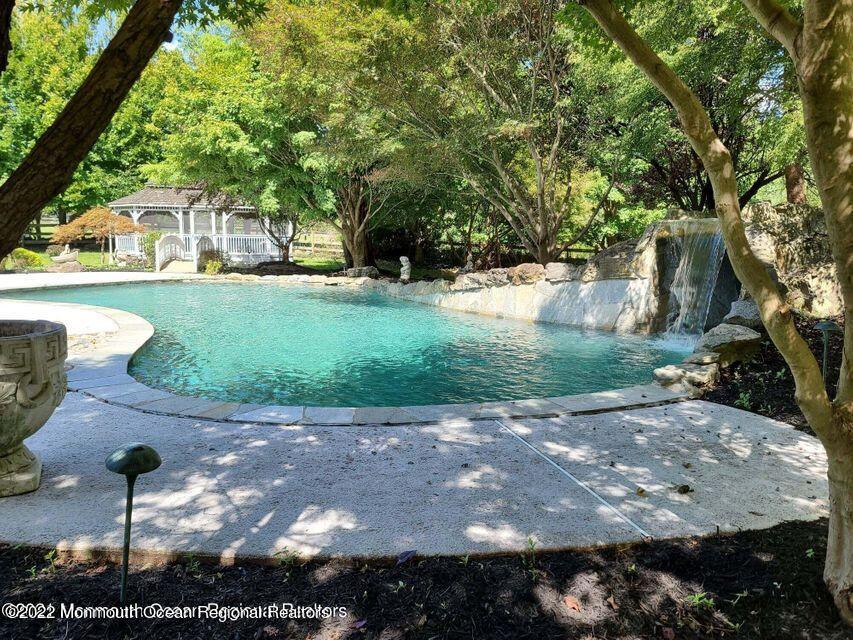 48 Mine Brook Road Colts Neck, NJ 07722 - Photo 39 of 51 pool with gazebo