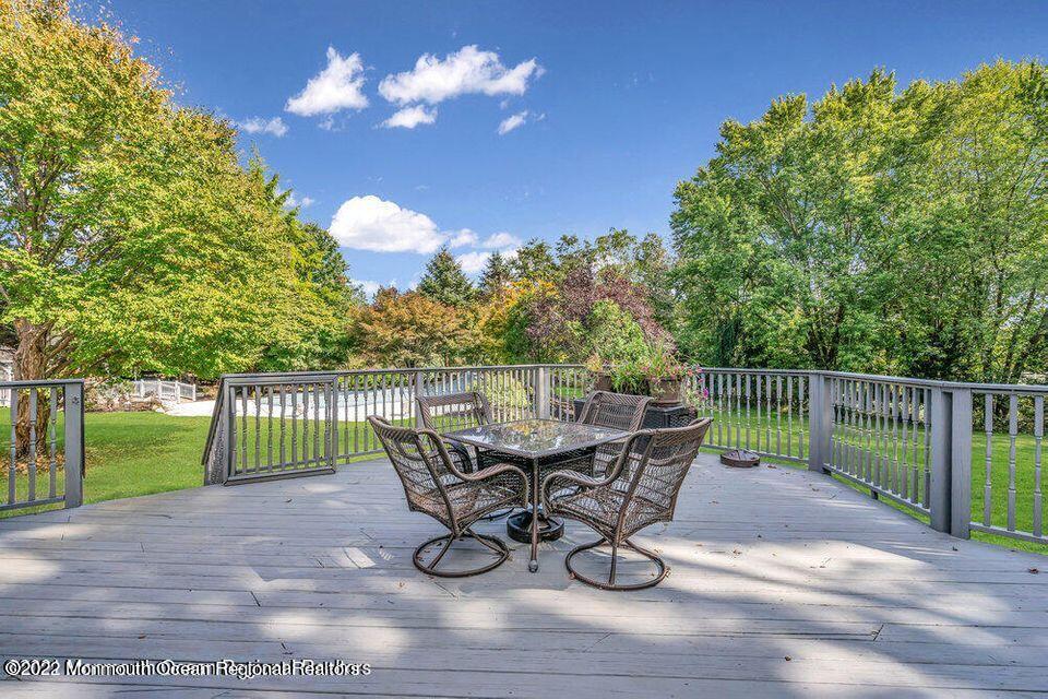 48 Mine Brook Road Colts Neck, NJ 07722 - Photo 43 of 51 patio with clouds