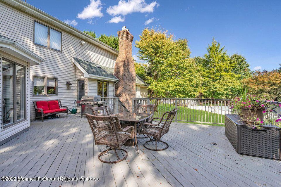 48 Mine Brook Road Colts Neck, NJ 07722 - Photo 44 of 51 patio with side of house