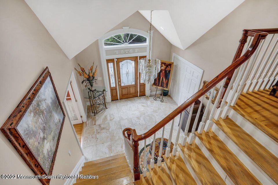 48 Mine Brook Road Colts Neck, NJ 07722 - Photo 5 of 51 foyer staircase