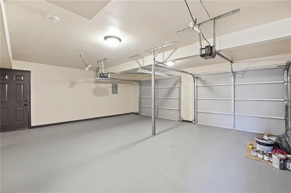 a balcony with wooden floor and trees