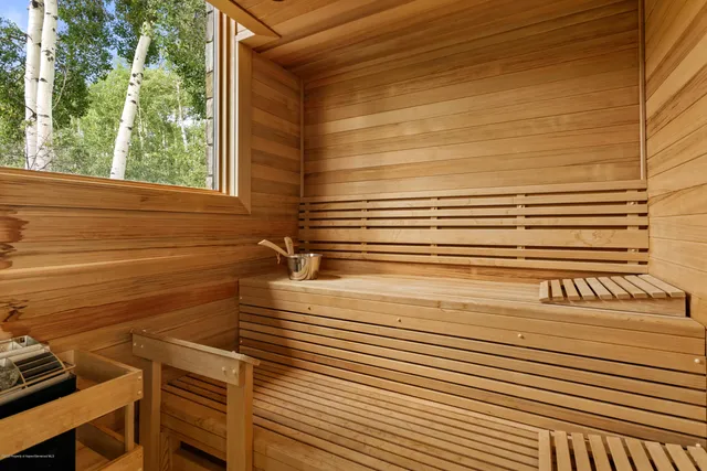 a view of a balcony with two chairs