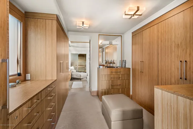 a bathroom with a double vanity sink and mirror