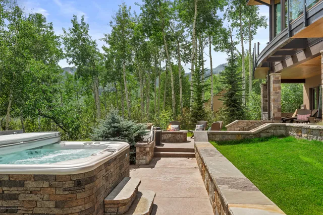 a view of a swimming pool with a patio