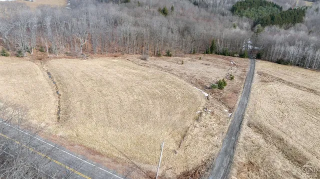 a view of a backyard of snow
