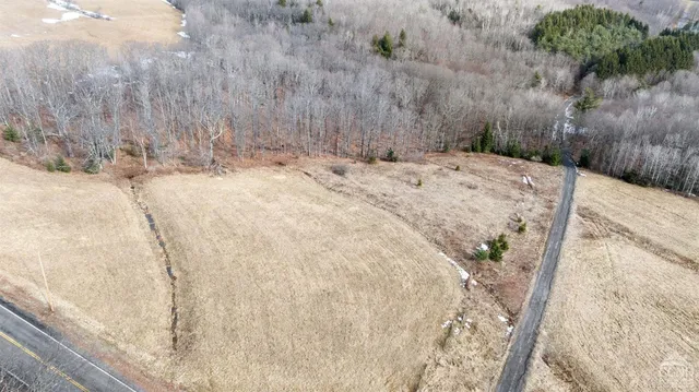a view of a backyard of the house