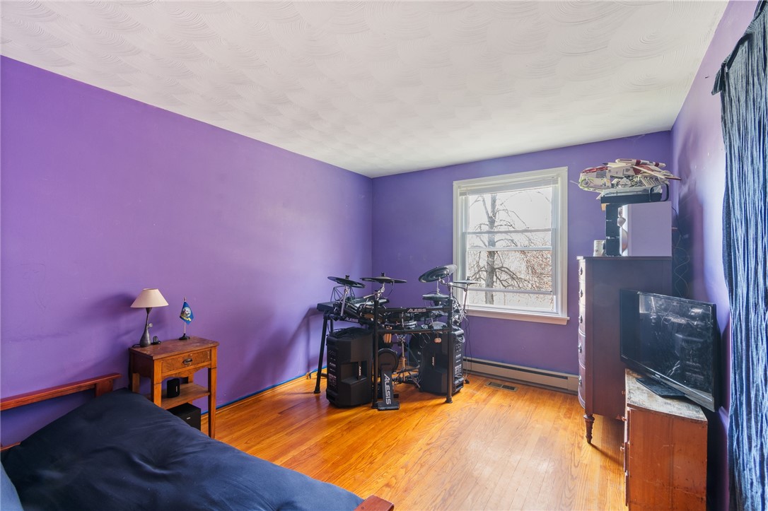 497 Hartnagle Road Arcadia, NY 14513 - Photo 28 of 49 One of the bedrooms- REAL HARDWOODS!