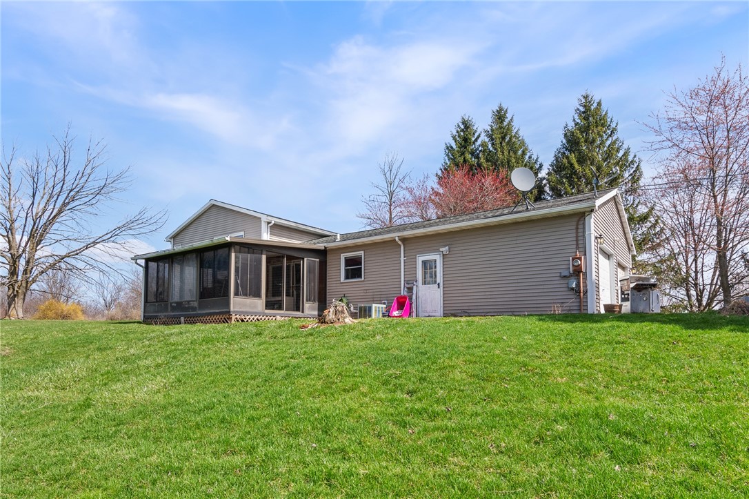 497 Hartnagle Road Arcadia, NY 14513 - Photo 40 of 49 The rear view of the patio room- so much room to P