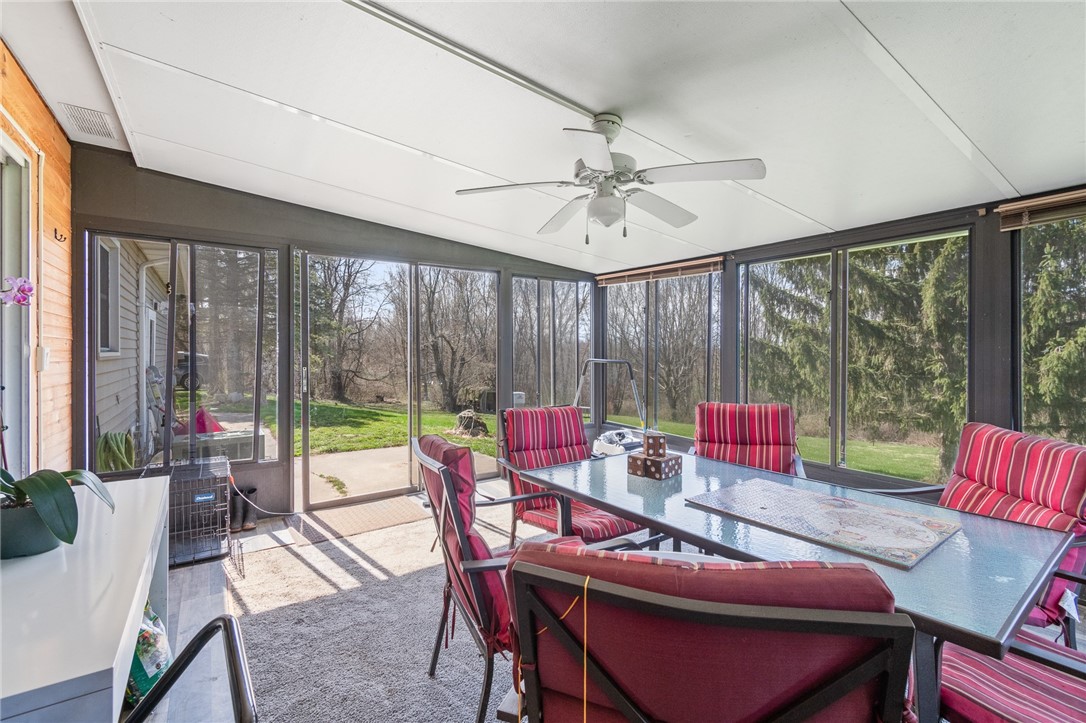 497 Hartnagle Road Arcadia, NY 14513 - Photo 7 of 49 The PATIO ROOM off the rear of the home - opens to