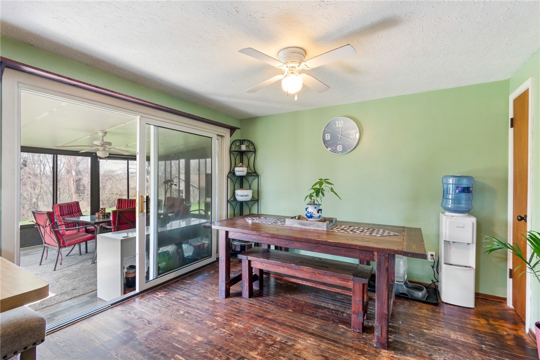 497 Hartnagle Road Arcadia, NY 14513 - Photo 9 of 49 The view from the kitchen to the PATIO ROOM!
