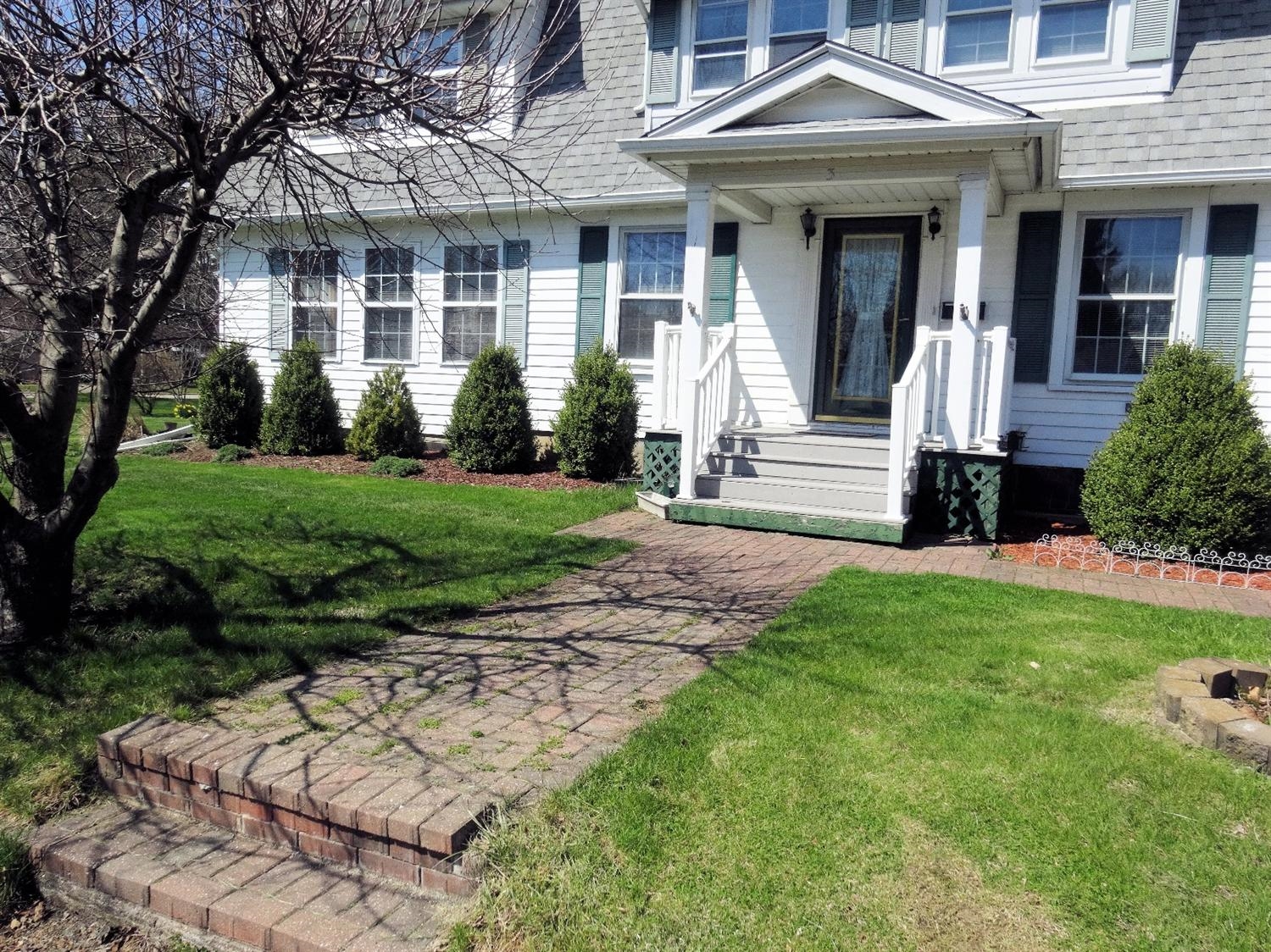 3 Harrison Boulevard Valparaiso, IN 46383 - Photo 2 of 10 a front view of a house with a yard