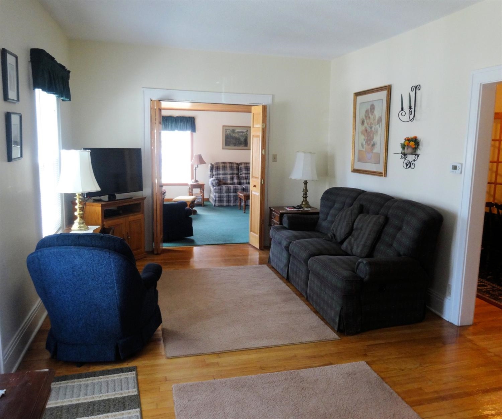 3 Harrison Boulevard Valparaiso, IN 46383 - Photo 5 of 10 a living room with furniture and a flat screen tv