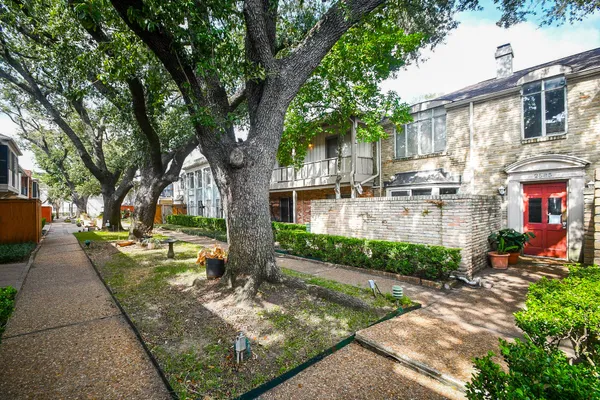 a view of a backyard with a garden
