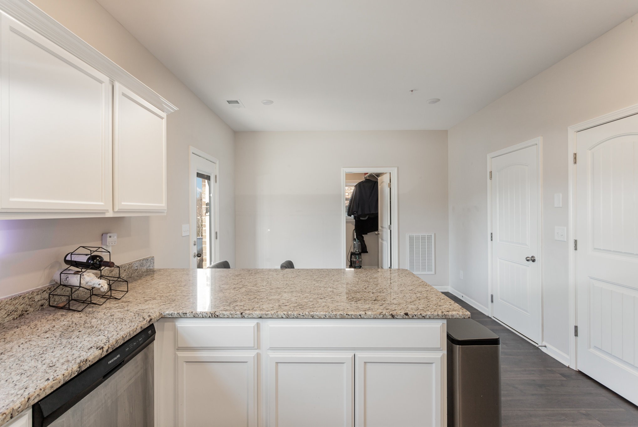 809 Callie Lane Pleasant View, TN 37146 - Photo 13 of 30 a kitchen with granite countertop a sink and cabinets