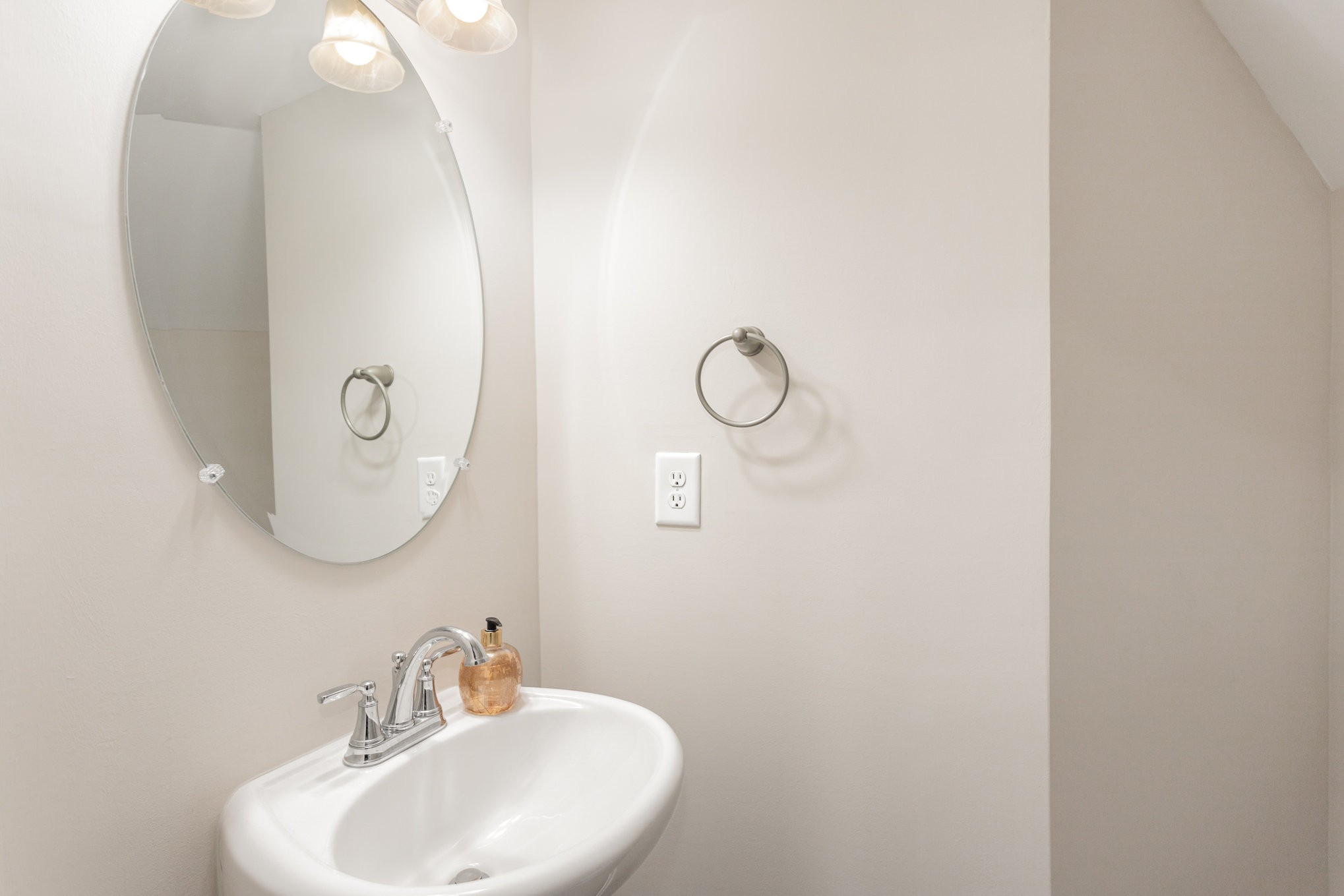 809 Callie Lane Pleasant View, TN 37146 - Photo 14 of 30 a bathroom with a sink and mirror