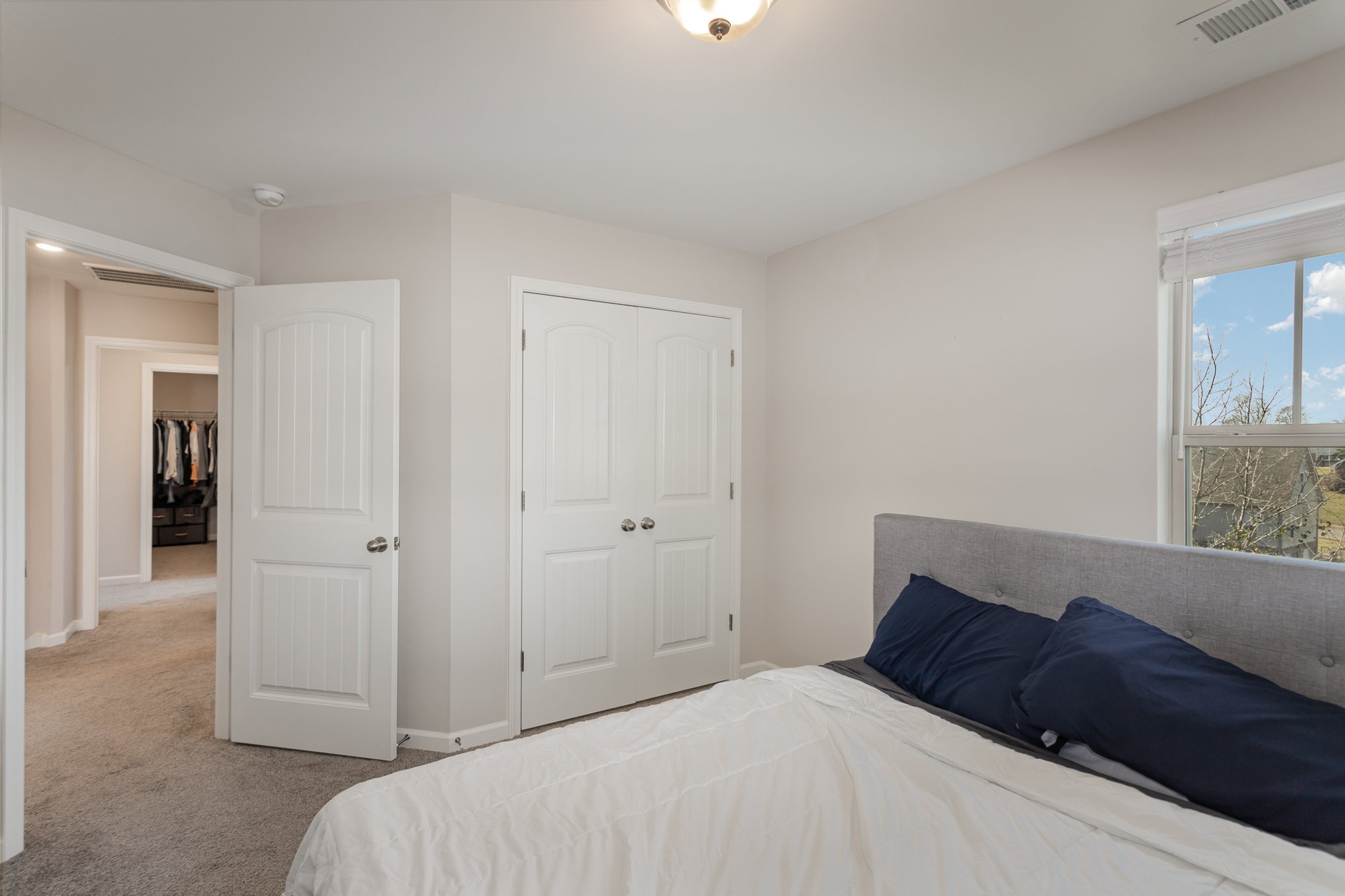 809 Callie Lane Pleasant View, TN 37146 - Photo 22 of 30 a bedroom with a bed and a window