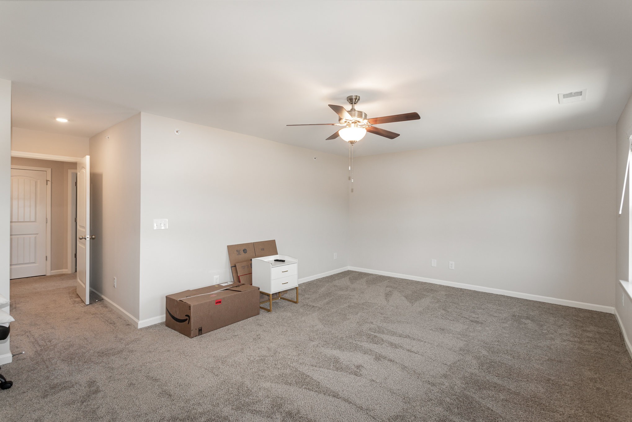 809 Callie Lane Pleasant View, TN 37146 - Photo 26 of 30 a view of a livingroom with a chandelier fan