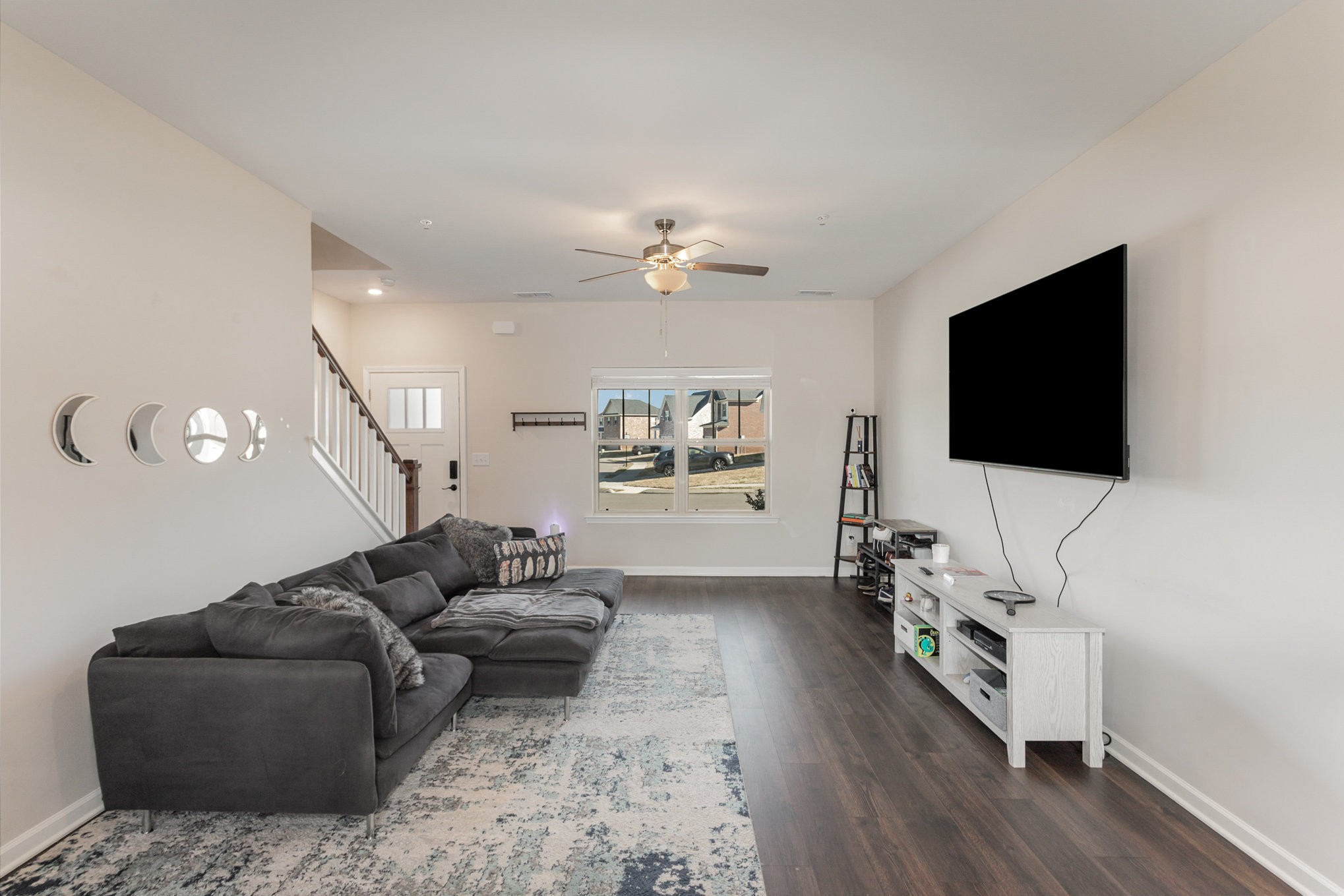 809 Callie Lane Pleasant View, TN 37146 - Photo 4 of 30 a living room with furniture and a flat screen tv