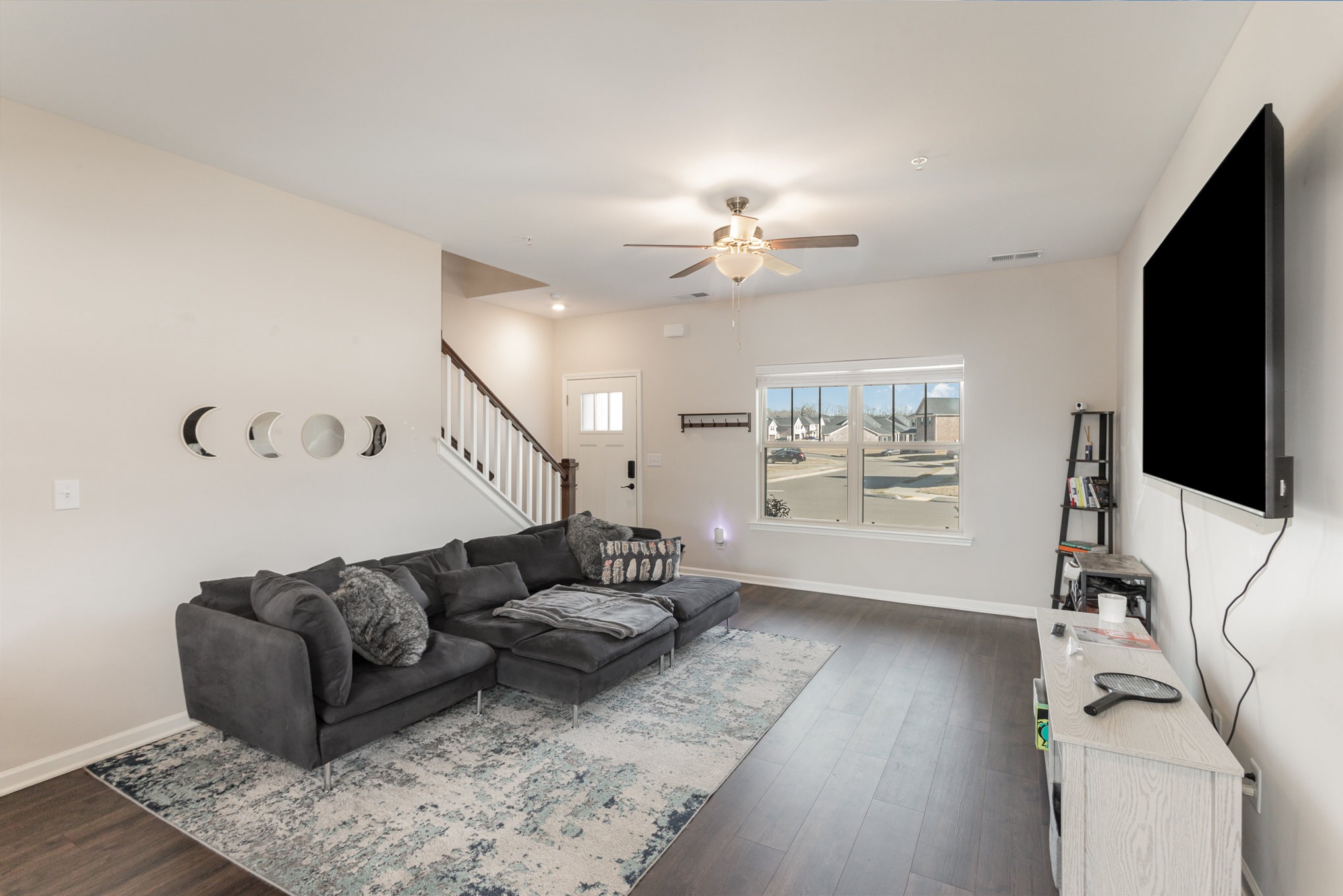 809 Callie Lane Pleasant View, TN 37146 - Photo 5 of 30 a living room with furniture and a flat screen tv