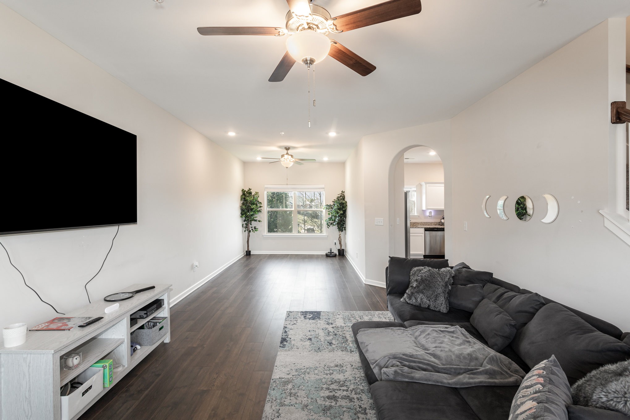 809 Callie Lane Pleasant View, TN 37146 - Photo 8 of 30 a living room with furniture and a flat screen tv