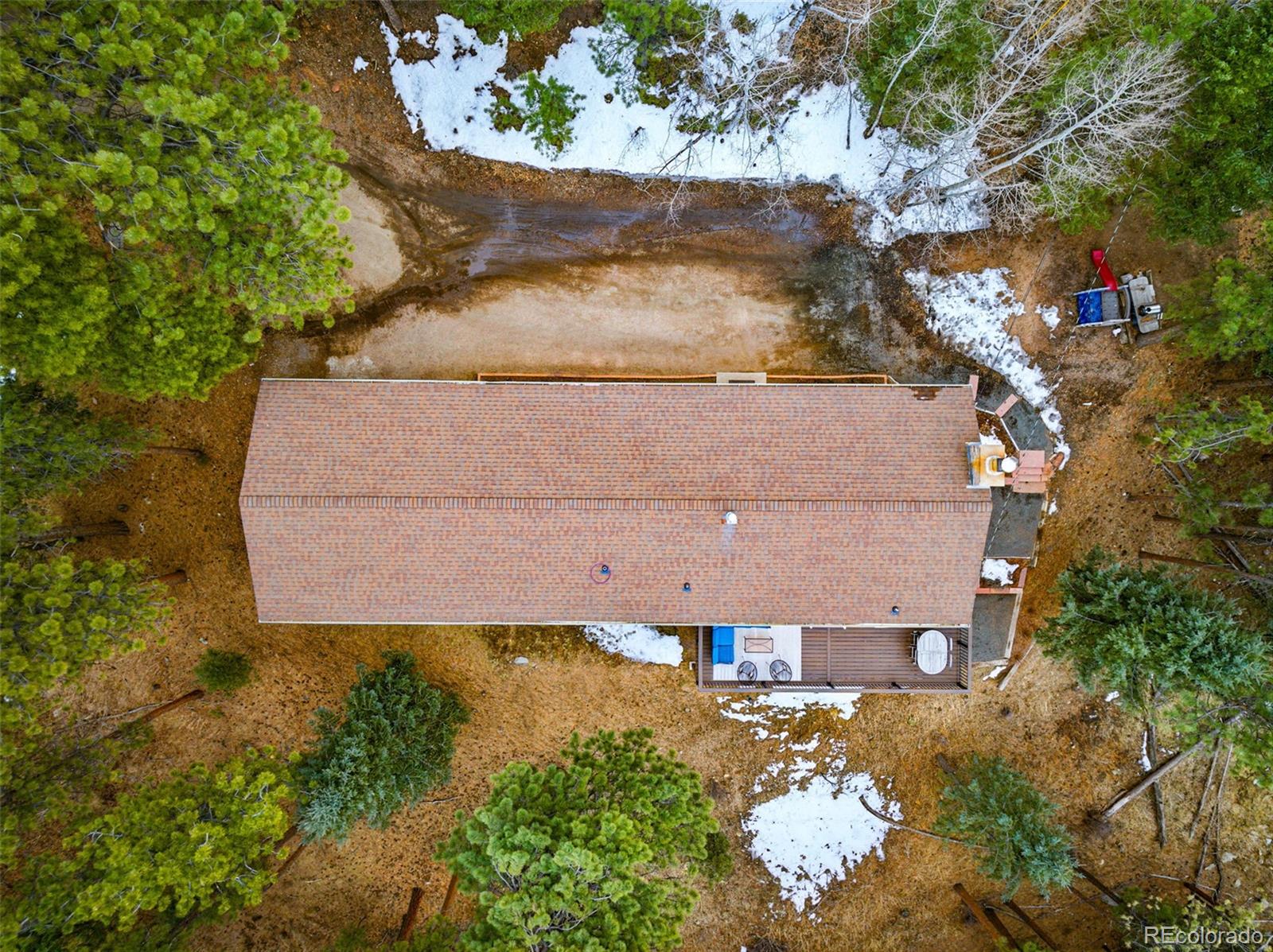 28254 Tresine Drive Evergreen, CO 80439 - Photo 38 of 44 an aerial view of a house with a yard