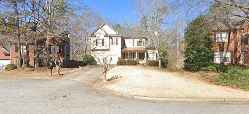 320 Morning Mist Walk Suwanee, GA 30024 - Photo 19 of 19 a view of a house with a patio