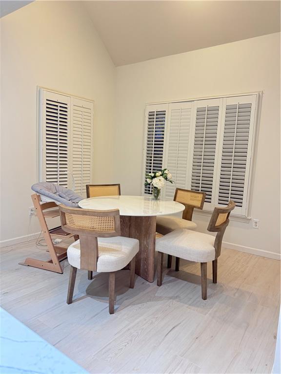 320 Morning Mist Walk Suwanee, GA 30024 - Photo 6 of 19 a room with a table and a chair