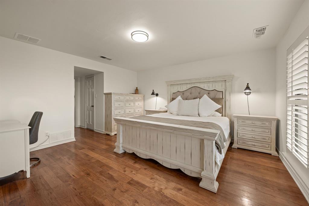 10902 Clear Creek Road West Sanger, TX 76266 - Photo 11 of 40 Bedroom featuring dark wood finished floors