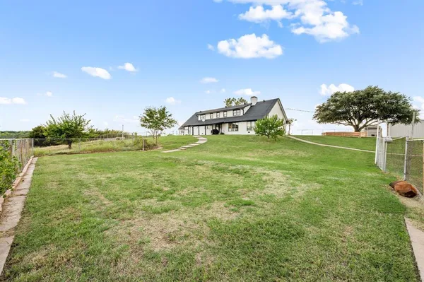 a house view with a garden space