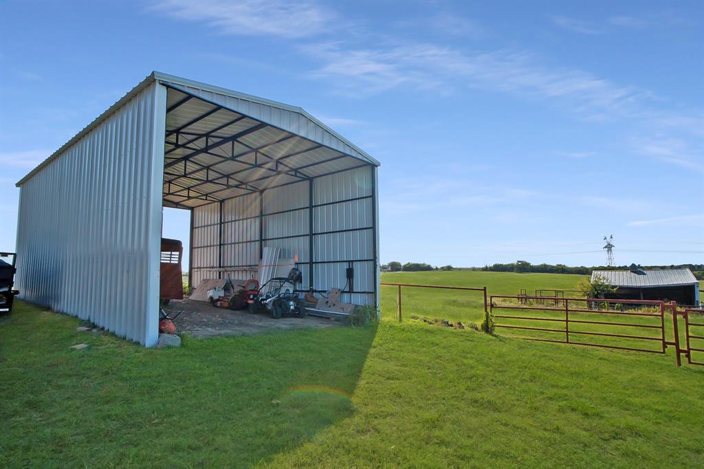 10902 Clear Creek Road West Sanger, TX 76266 - Photo 26 of 40 View of pole building featuring a view of rural / pastoral area