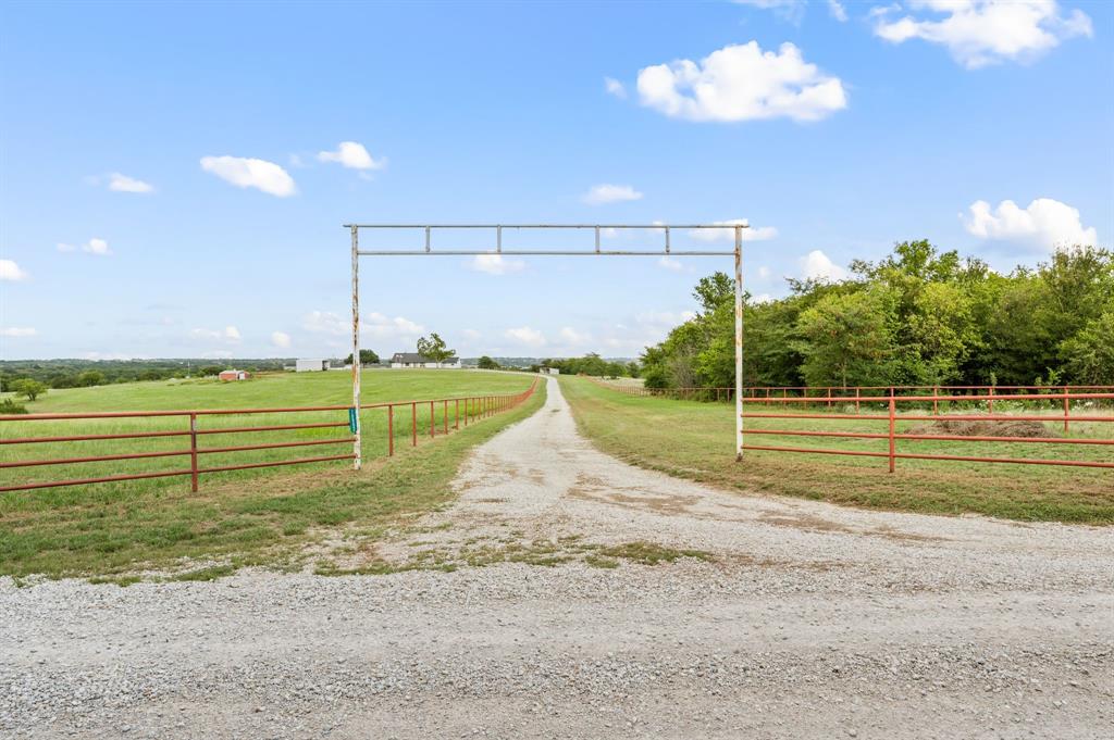 10902 Clear Creek Road West Sanger, TX 76266 - Photo 34 of 40 View entry driveway featuring a view of countryside