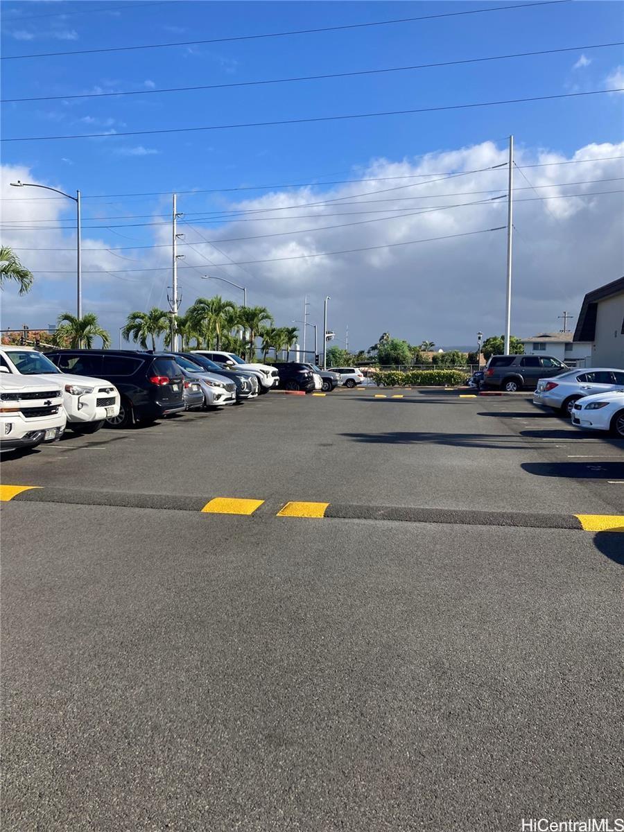 4280 Salt Lake Boulevard, Unit C13 Honolulu, HI 96818 - Photo 14 of 16 a view of street with cars