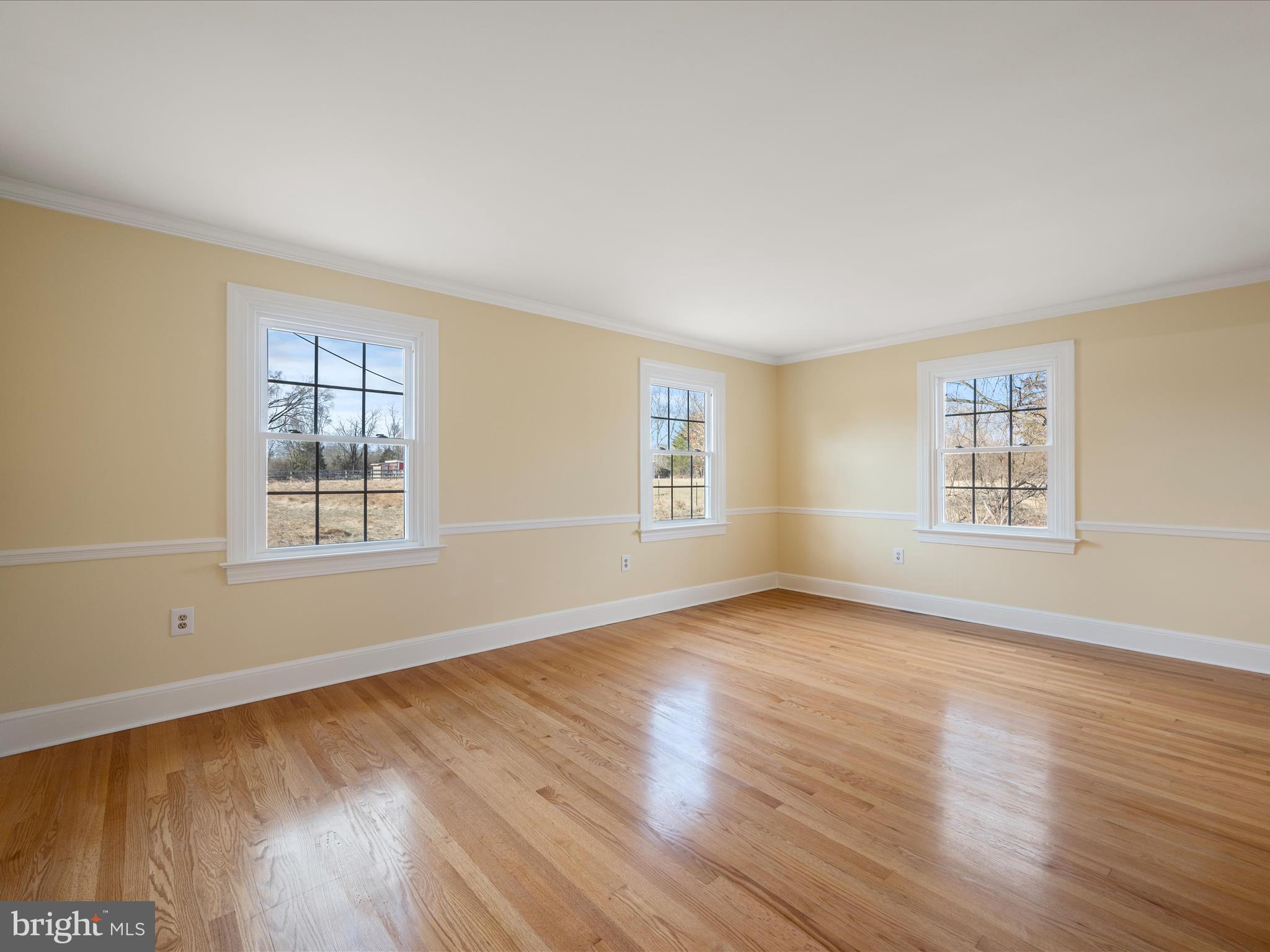 237 Summerville Road Boyce, VA 22620 - Photo 17 of 53 a view of an empty room with wooden floor and a window