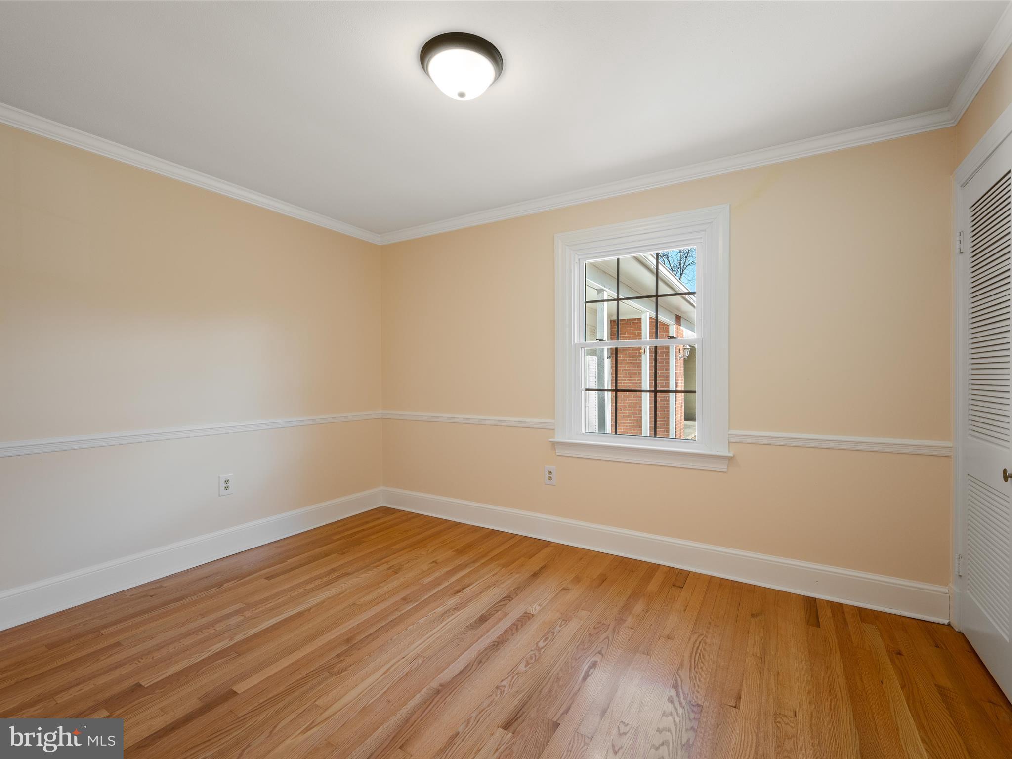 237 Summerville Road Boyce, VA 22620 - Photo 19 of 53 an empty room with wooden floor and windows