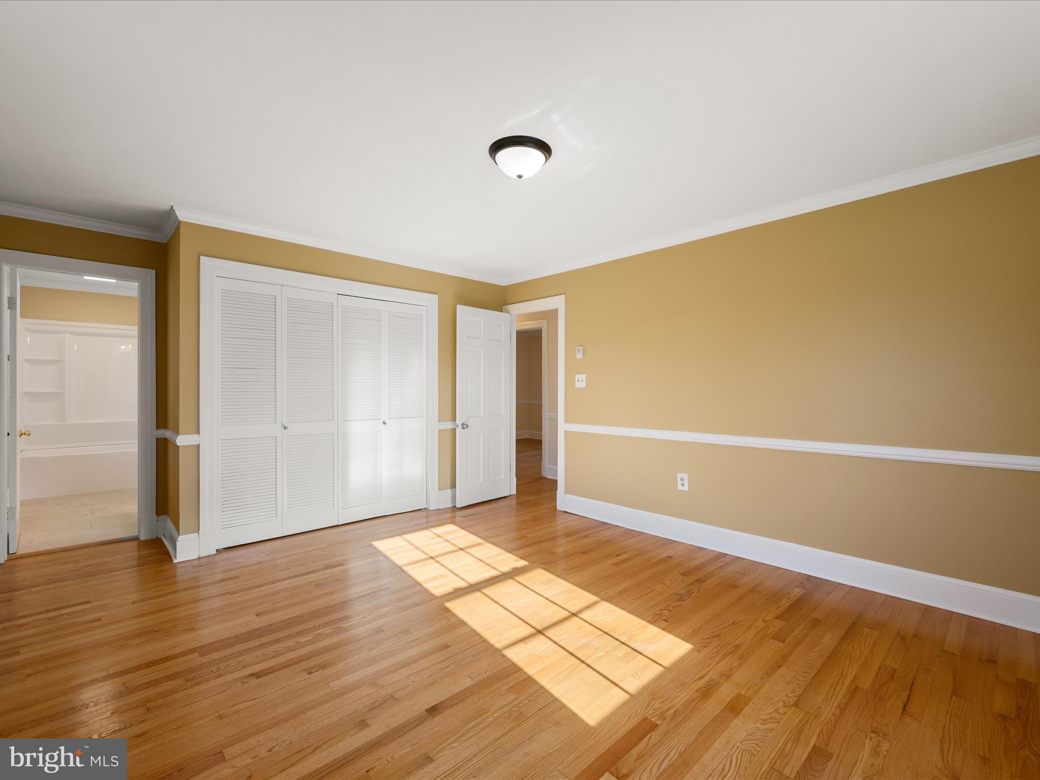 237 Summerville Road Boyce, VA 22620 - Photo 26 of 53 an empty room with wooden floor and windows