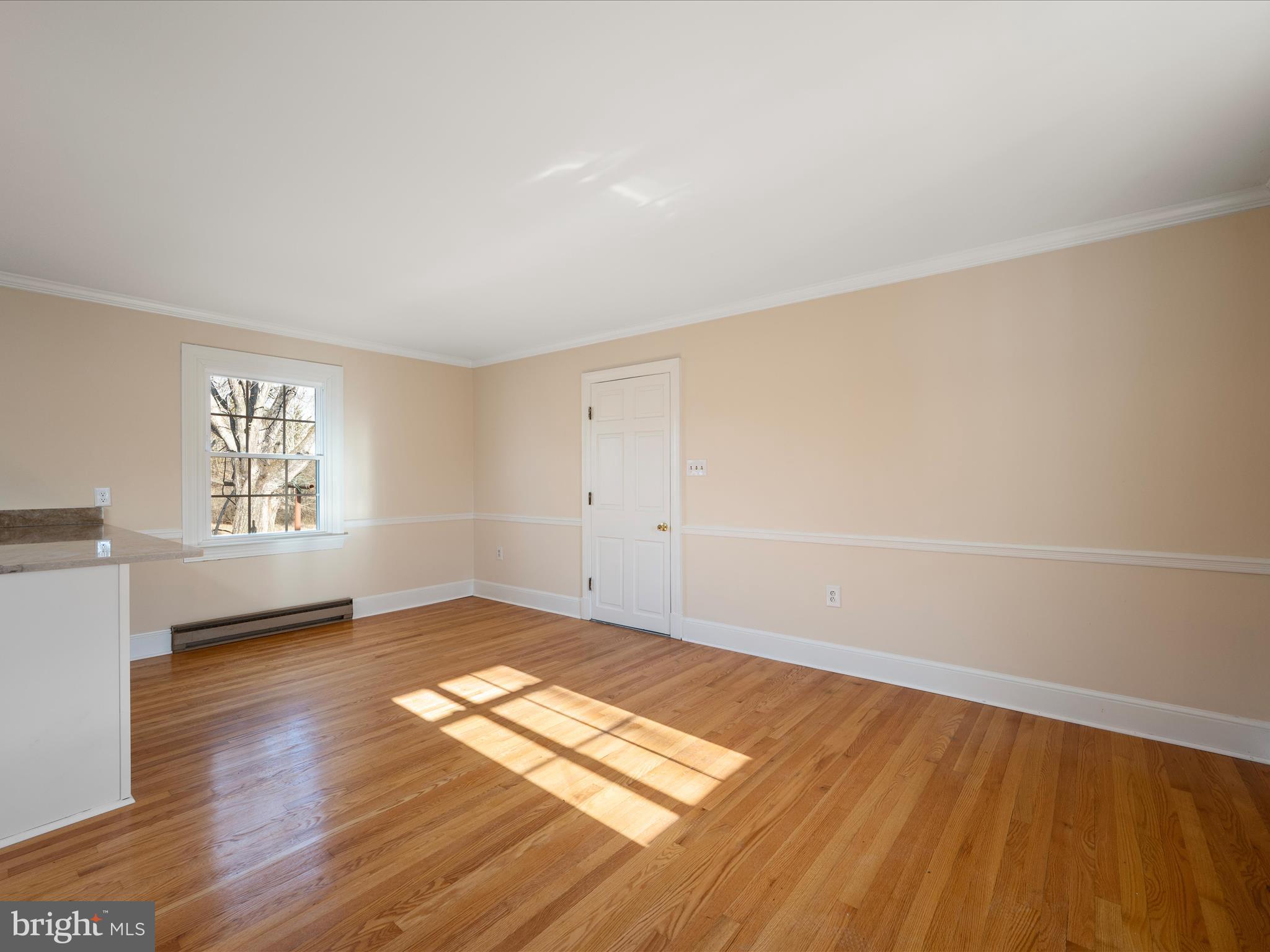 237 Summerville Road Boyce, VA 22620 - Photo 4 of 53 an empty room with wooden floor and windows