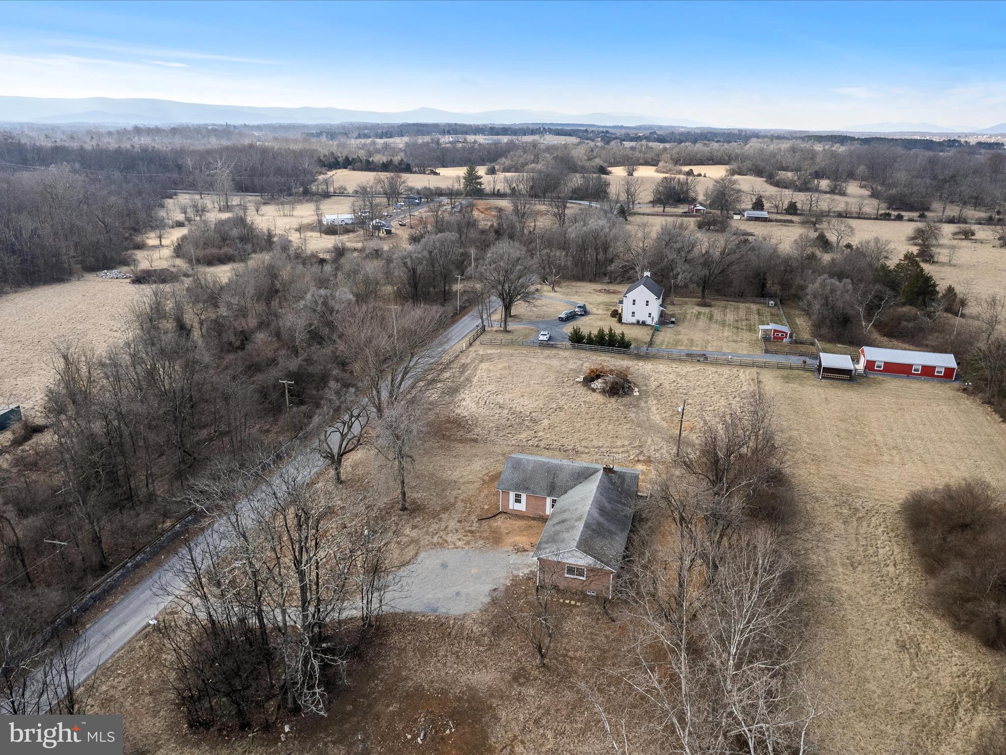 237 Summerville Road Boyce, VA 22620 - Photo 46 of 53 an aerial view of a yard with horses