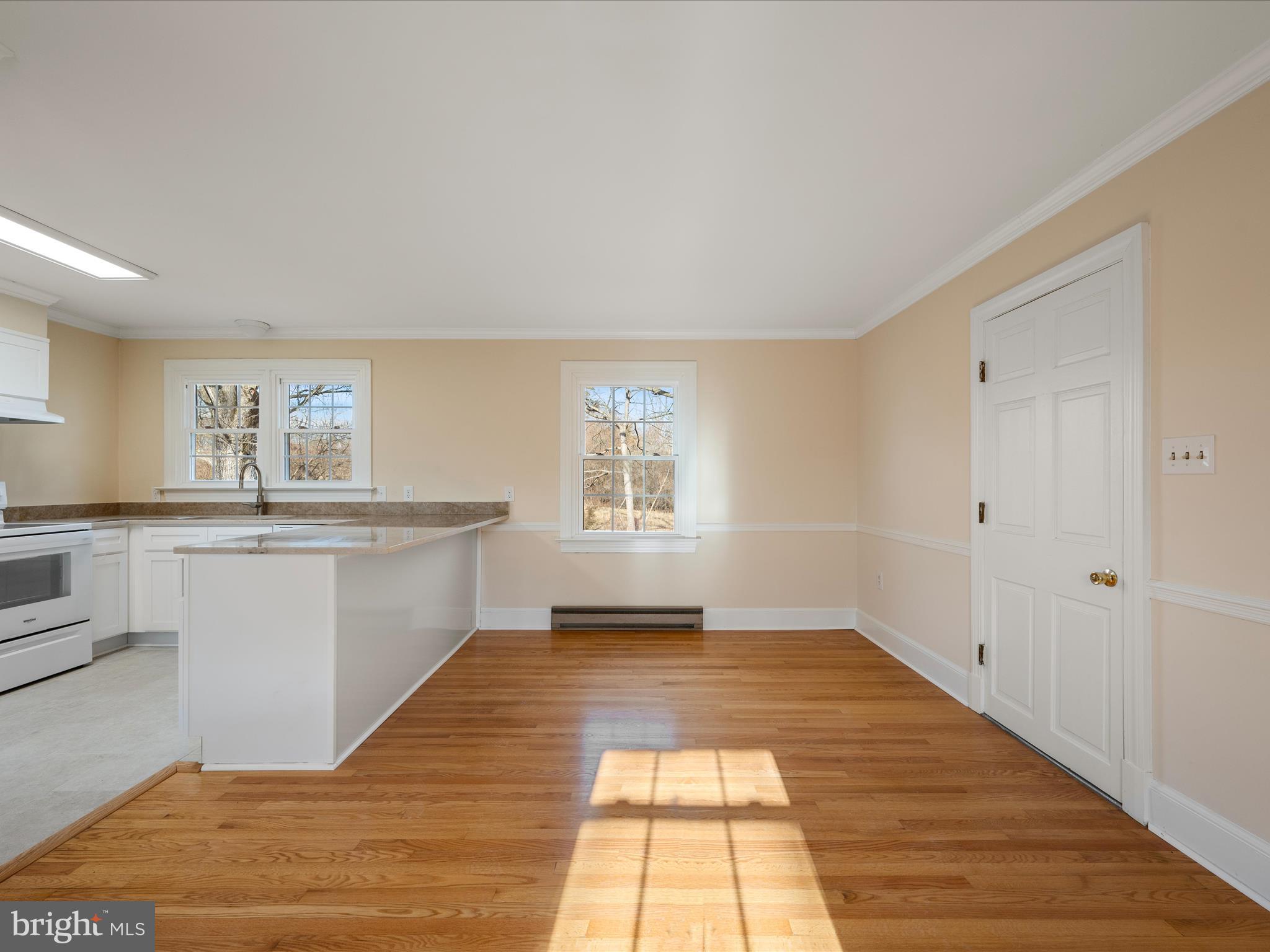 237 Summerville Road Boyce, VA 22620 - Photo 5 of 53 a view of a kitchen with wooden floor and a window