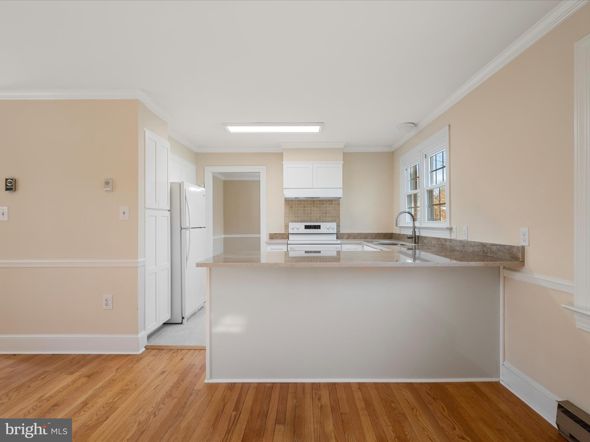 237 Summerville Road Boyce, VA 22620 - Photo 6 of 53 a large white kitchen with wooden floor