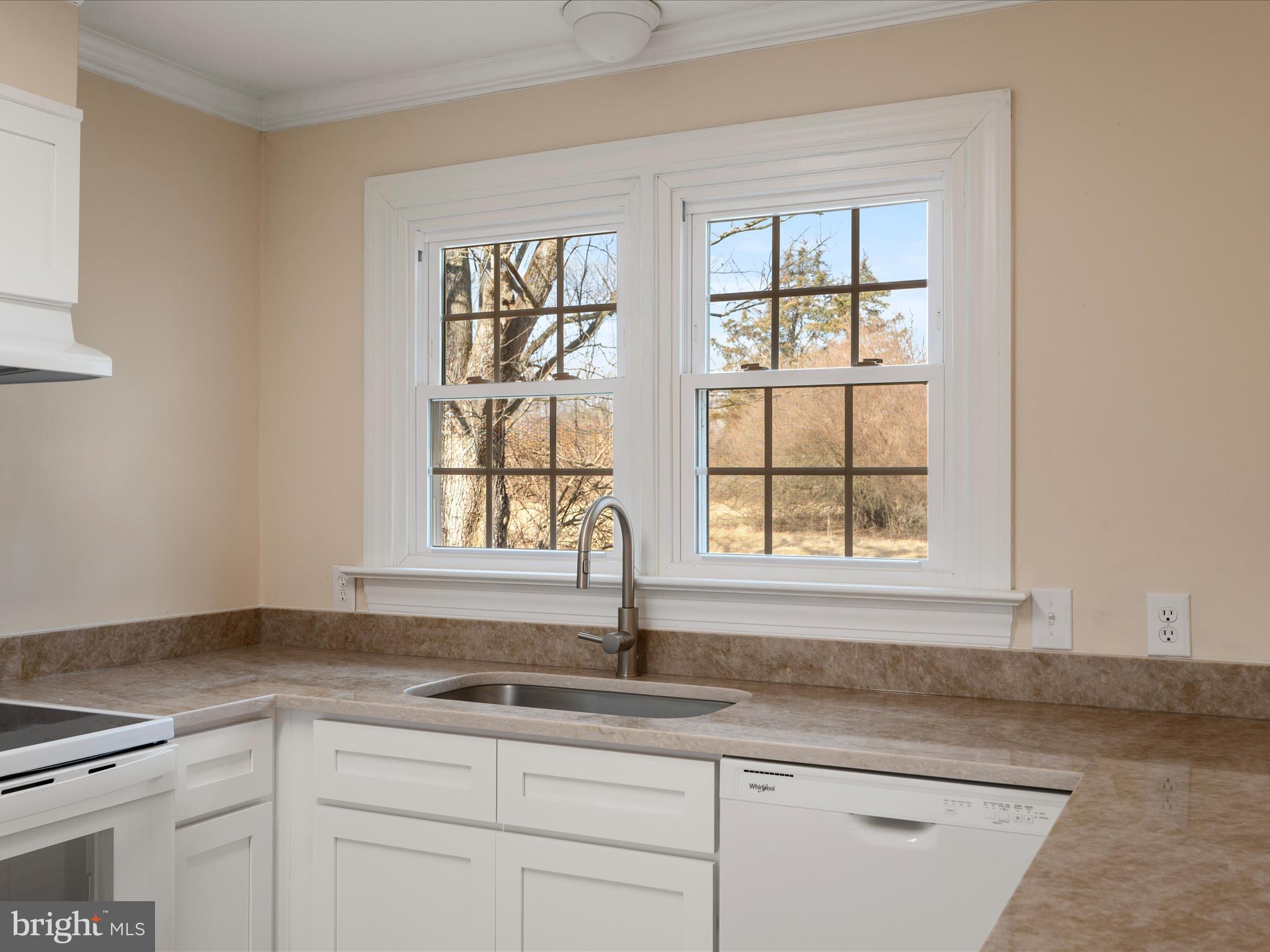 237 Summerville Road Boyce, VA 22620 - Photo 9 of 53 a kitchen with granite countertop a sink window and cabinets