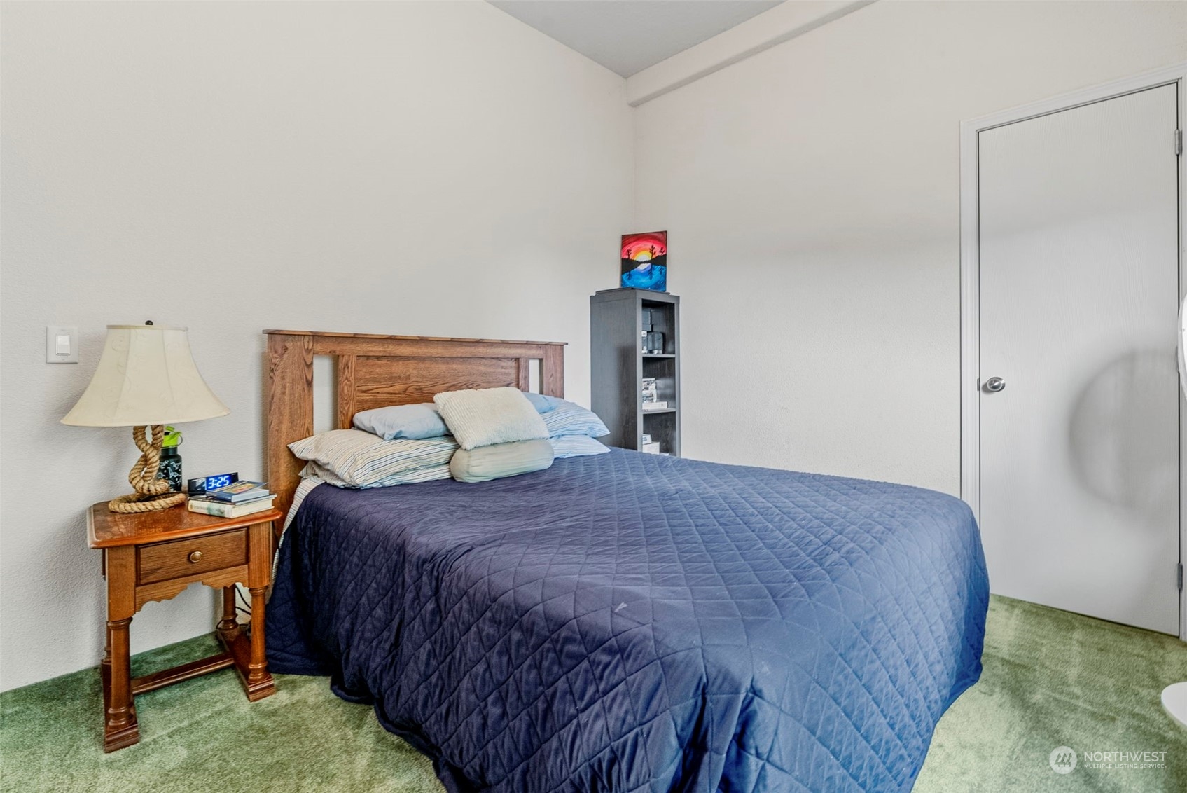 6100 Willow Grove Road Longview, WA 98632 - Photo 15 of 35 a bedroom with a bed and a lamp on table